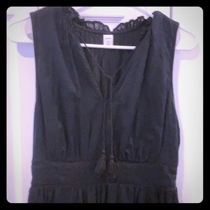 Black high low dress with waist detail & tassels